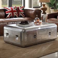 For family game night, have board games easily accessible inside of a large trunk. Benzara Trunk Aluminum Coffee Table With Storage Wayfair
