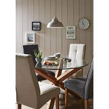 A rectangular dining table set is best paired with a formal décor and maybe even a china hutch. Ariya Glass Table
