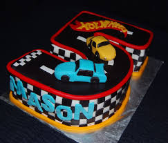 Car Birthday Cake For 5 Year Old Boy Leelees Cake Abilities Hot Wheels Cake And Cupcakes Hot Wheels Cake Hot Wheels Birthday Cake Wheel Cake