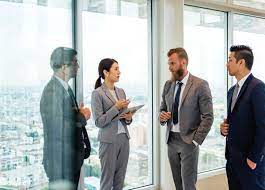 Download Premium Image Of Business People Talking And Discussing Corporate Business People Business Photoshoot Corporate