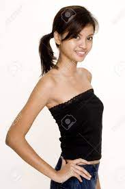 A Young Attractive Asian Woman In A Black Tube Top Stock Photo, Picture and  Royalty Free Image. Image 200405.