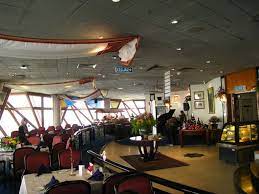 Business or smart casual dress. Kuala Lumpur Seri Angkasa Revolving Restaurant Menara Foodietraveller