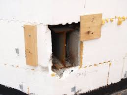 What we can't see in the photo is if the carpenter put extra blocking under the exterior bottom wall plate so the load is transferred to the poured, or cast, concrete foundation wall. Icf Systems Ltd Speciality Detail Photos