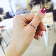 Yin and yang inspired middle finger tattoo. 50 Eye Catching Finger Tattoos That Women Just Can T Say No To Tattooblend