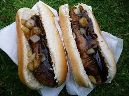 Sausage Sizzle Sausages With Grilled Onions Bbq Sauce Australian Bbq New Zealand Cuisine Australian Food
