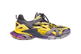 In 1937, cristóbal balenciaga established his fashion flagship in paris. Balenciaga S Latest Track 2 Sneaker Borrows The Lakers Yellow Purple Colors Sneakers Balenciaga Sneakers Balenciaga