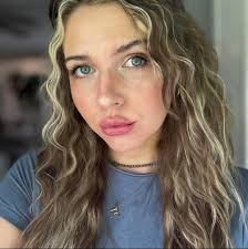 My mom bought me this taylor swift red cardigan and I was just wondering if  it was the real thing or if it is a dupe? Thank you