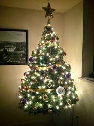 Easiest Christmas Tree To Assemble And Store Hangs From A Swag Hook In The Ceiling So It Looks L Simple Christmas Tree Christmas Decorations Christmas Crafts