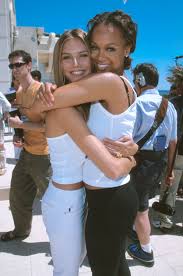 Her career as a top fashion model and swimsuit star began almost by accident when, on a lark, she submitted photos to a model competition hosted by petra. Tyra Banks And Heidi Klum Victoria S Secret Angels America S Got Talent Vogue