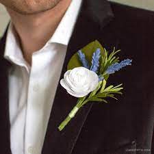How to easily make a homemade boutonniere out of flowers. Craft Your Own Crepe Paper And Rosemary Diy Boutonniere