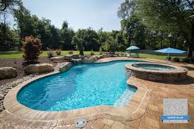 This Krystalkrete Super Blue Pool Ties Together A Great Range Of Color And Unique Complimentary Features Pool By Mon Pool Colors Pool Plaster Pool Shapes