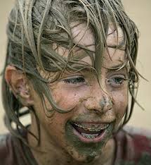 Kids brave mud pit for Irvine youth programs