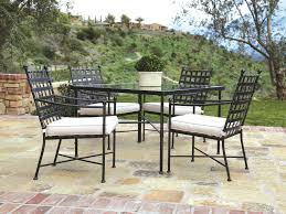 Wrought iron dining tables can be more interesting than a simple wooden table. Sunset West Provence Wrought Iron Dining Set Swprovdinsetnonstock
