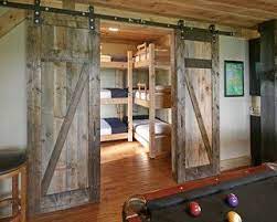 Maybe you would like to learn more about one of these? Chestnut Lodge Traditional Family Room Atlanta By Modern Rustic Homes Rustic House Barn Door Designs Small Hunting Cabin