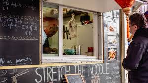 I'm not looking forward to the day the downtown food cart pods pack up and roll elsewhere. Third Avenue Food Cart Pod Downtown Portland Portland Oregon U S Street Food Review Conde Nast Traveler