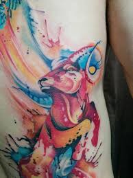 Black and grey tattoos utilize black and grey ink, creating a similar effect to a black and white photo. Chronic Ink Tattoo Toronto Tattoo Close Up Shot Of A Watercolour Ram Tattoo Done By Tegan Aries Tattoo Capricorn Tattoo Abstract Tattoo