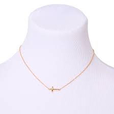 Maybe you would like to learn more about one of these? Gold Sideways Cross Pendant Necklace Claire S