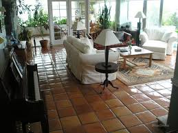 I Love This Look Thinking Of Putting Terracotta Tile In My Townhome Tile Floor Living Room Living Room Tiles Mexican Tile Floor