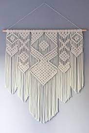 See the article to get the full details. Large Macrame Wall Hanging Available In White Gray Etsy Macrame Wall Hanging Wall Hanging Diy Macrame Wall Art