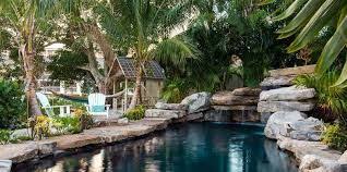 Image Result For Insane Pools Off The Deep End Insane Pools Pool Landscaping Tiki Hut