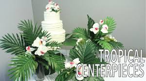 An abundance of spectacular flowers plus loads of tropical greenery dazzles the eye, bringing dramatic vibrancy and life where ever they rest. Tropical Leaf Centerpieces Hawaiian Party Decorations Artificial Flower Arrangement Youtube