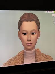 Does Ariana Grande look better with dark or blonde hair?