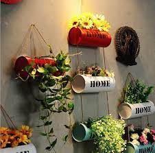 Are there any special values on metal wall decor? Wholesale Metal Wall Hanging Plant Pot Decorative Metal Plant Pots Indoor For Home Decor Buy Wall Hanging Plant Pot Decorative Metal Plant Pots Indoor Metal Flower Pot Product On Alibaba Com