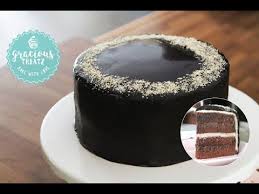 This chocolate sponge cake has a deep chocolate infused sponge that is sandwiched together with a thick chocolate frosting that melts in the mouth. Chocolate Sponge Cake With Chocolate Ganache Frosting Youtube