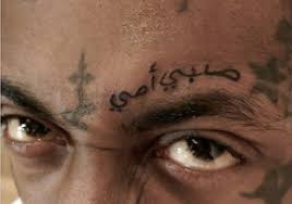 The mixed imagery of his chosen body art. Lil Wayne S Arabic Tattoo Goes Terribly Wrong