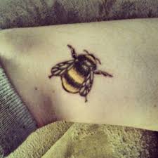 A friendly bumble bee tattoo would make a great tattoo for anyone looking for a small ankle tattoo. Bee Tattoos And Designs Page 4 Bumble Bee Tattoo Bee Tattoo Tattoos