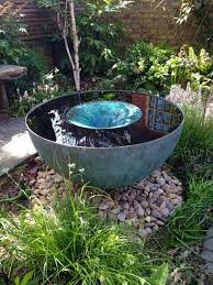 The Stunning Volute Water Feature By Tills Innovations A Vortex Being Captured Modern Water Feature Water Features In The Garden Small Water Features