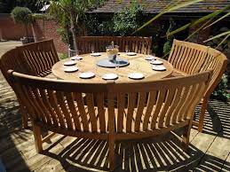 We have a wide range of teak dining furniture sets crafted from sustainable plantation teak for superior quality and durability, this dining set with round table and curved bench is sure to impress your guests. Curved A Grade Teak Garden Bench Betjeman 195cm Rattan And Teak