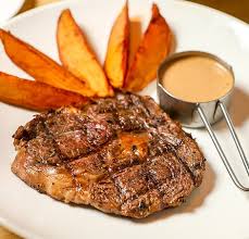 Stir in the flour and cook for 1 minute. Ribeye Steak With Mushroom Sauce And Potato Wedges Picture Of The Olive Steakhouse Ho Chi Minh City Tripadvisor