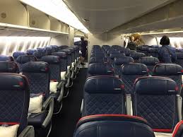 main economy cabin with delta comfort seats in front on