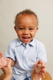 How to make a crying child smile in a photo?