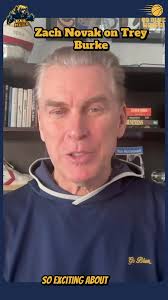 Trey Burke and Son Michigan Jersey Hanging