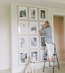 Gallery walls or photo walls have become quite popular over the last few years, providing an easy way to update your interiors, transform bland walls, create a focal point in your home. How To Create A Grid Gallery Wall Framebridge