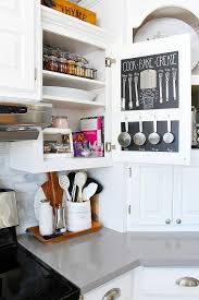 A white cafe curtain and gray tile. How To Keep Kitchen Counters Clutter Free Clean And Scentsible