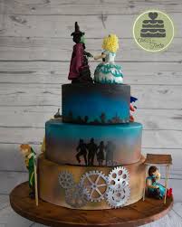 I think this is a better use than cake topper since it's cardboard. Wicked The Musical Wizard Of Oz Cake A Photo On Flickriver