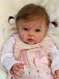 More beautiful babies from various reborn artists. Raven, Teegan and Adele,  happy Juliana and Raven again. (I am just showing what these kits can look  like and do not have information about