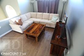 A metal crisscross base is visually appealing and creates a sturdy look. Rustic Reclaimed Wood Coffee Table Blog