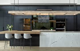 Clean lines, natural materials and simple ornamentation are elements commonly found in modern kitchen spaces. A Moody Modern Kitchen Design By Maker May Habitus Living