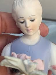 Two (2) Porcelain Figurines