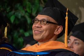 Balancing science and art: Nursing's Dr. Jay Tumulak inducted into  prestigious association