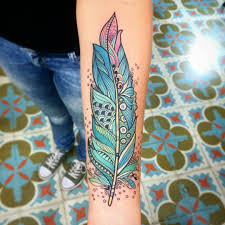 Even feather designs are available in different colors. Unique Colorful Feather Tattoo On Forearm
