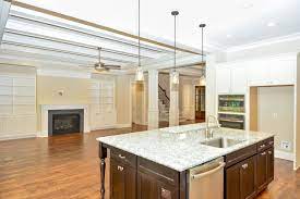 32 to 44 inches, depending on exactly location and amount of expected foot traffic nearby Kitchen Islands With Sink And Dishwasher Kitchen A Well Sized Center Island P Kitchen Island With Sink Kitchen Island With Sink And Dishwasher Sink In Island