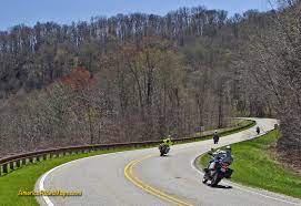 Spring On The Cherohala Skyway This Outstanding Long And Winding Mountain Motorcycle Ride Is On Of The Most Popular In Tn Bike Trips Riding Motorcycle Trip