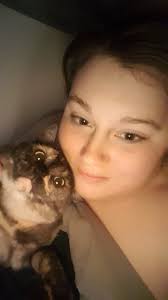 Another one of my kitties! This little girl is Noelle. She came to me last  November a scared little girl. She's snoozing with her three dachshunds.  They all adore each other |