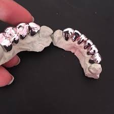 Make sure to brush and floss. 22kt Semi Permanent Gold Teeth Solid Gold Open Face Permanent Gold Teeth Gold Teeth Semi Permanent