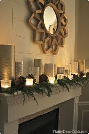 Good Idea Thrifted Glass Candle Holders Wrapped In Gold And Silver Wrapping Paper Christmas Mantle Decor Christmas Mantels Holiday Decor